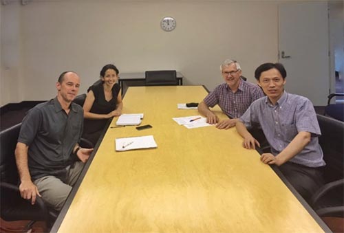 Foot BioTec CEO Dr Daniel Zhang (m.b.b.s Acu. AHPRA) and the Product Manager Robert Herde discussing with Associate Professor Vivienne Chuter and Dr Martin Spink at the Department of Podiatry of University of New Castle about joint research projects.